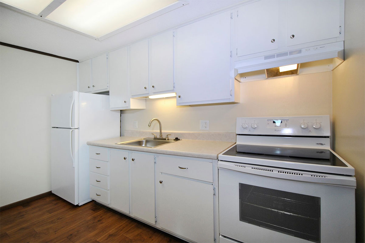 interior rendering of an apartment clubhouse with two pool tables and many windows